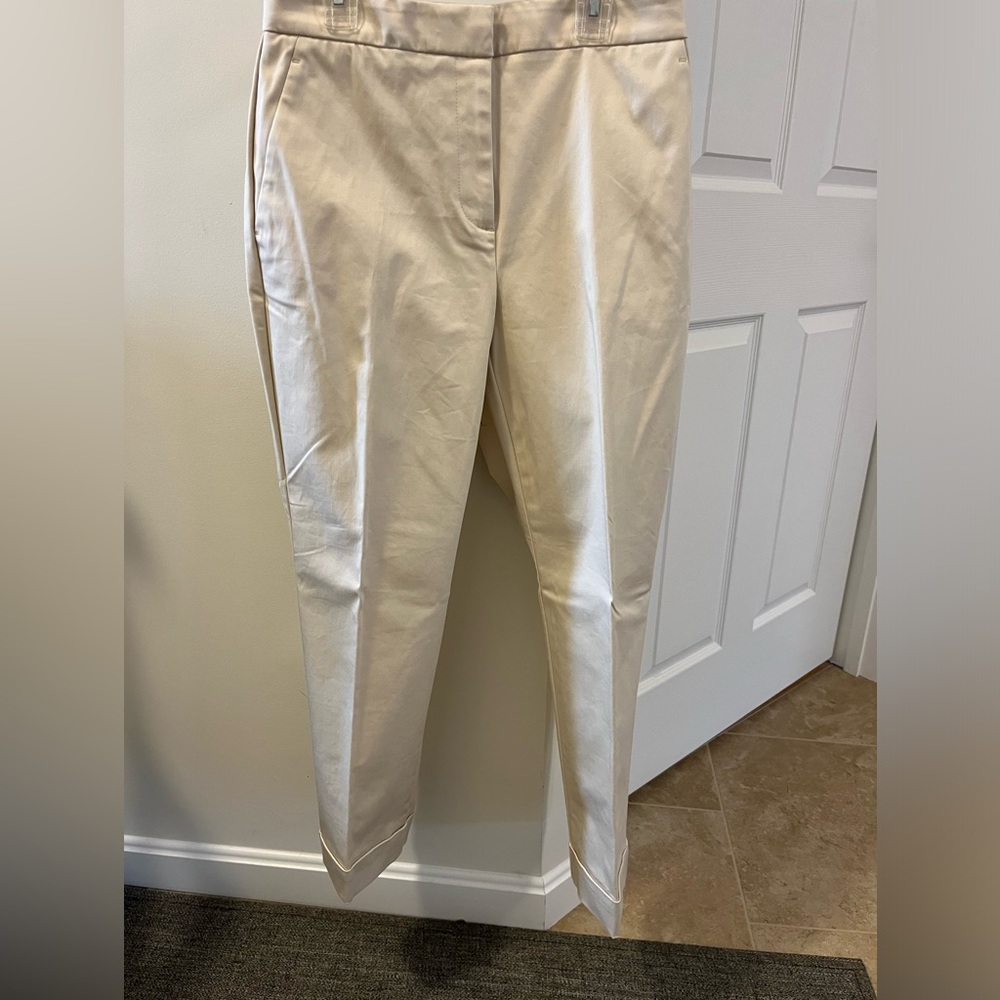 New with tag beige cotton straight leg pants. Size 2